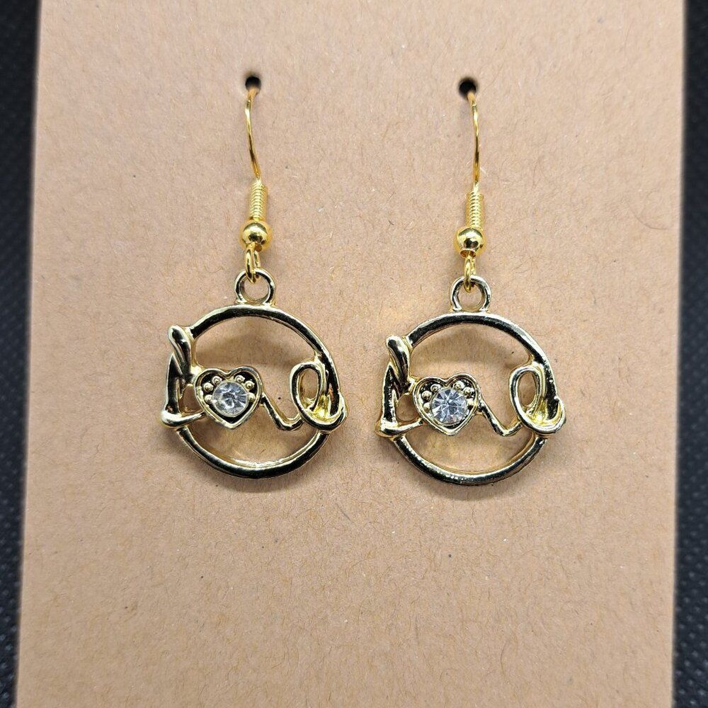 Circle of Love gold tone dangle earrings